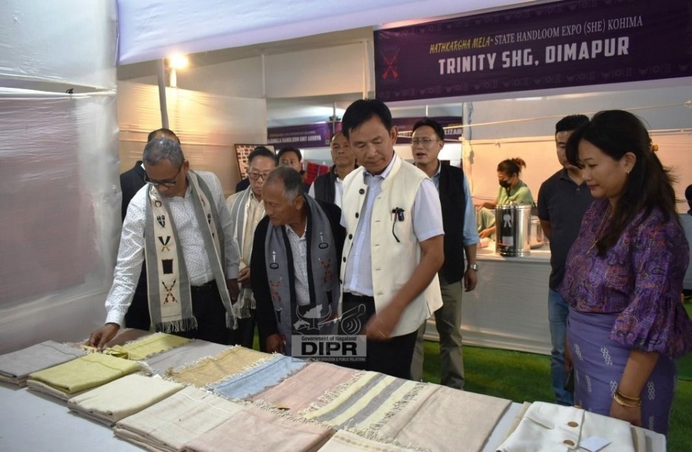Director I&C, Tokugha Sema and other officials inspecting the Hathkargha Mela State Handloom Expo held at KVC Ground. (DIPR Photo)